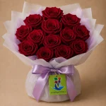 A bouquet of 12 deep-red roses