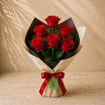 A bouquet of 6 red roses