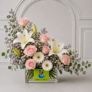 A glass-vase arrangement featuring 6 pale-pink roses
