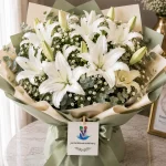 A bouquet of 12 white lilies