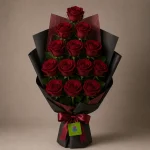 A bouquet of 13 deep red roses
