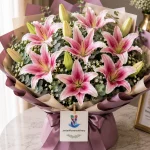 A bouquet of 12 pink lilies