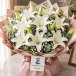 A bouquet of 20 white lilies